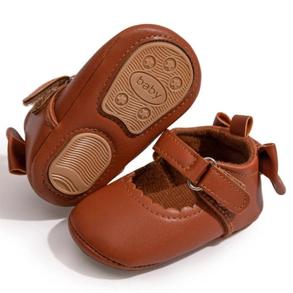 Introducing our adorable butterfly-knot Mary Jane Baby Shoes, perfect for princesses from newborn to 18 months! With a non-slip sole, your little one will stay safe and stylish. Available in multiple colors and sizes.