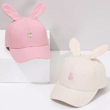 Load image into Gallery viewer, Introducing the adorable Bunny Ears Baseball Hat, available in pink, black, white, and khaki for children newborn to 3 years old! Perfect for adding a touch of cuteness to any outfit.
