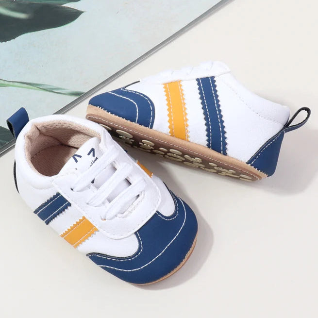 Designed with expert precision, these baby sneakers are crafted to fit children aged newborn through 18 months old with ultimate comfort and style.