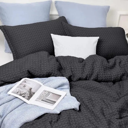 Experience the ultimate comfort and luxury with our Black Cotton Duvet Cover Set, available in multiple sizes and perfect for kids. Crafted with 100% cotton, this bedding set offers exceptional softness that only gets better with each wash. Its sweat-absorbing and breathable fabric will keep you feeling cool and comfortable in every season. Treat yourself to a delicate and luxurious touch with our duvet cover set. Available in twin, queen, and king sizes.