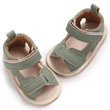 Load image into Gallery viewer, Indulge your little one in the ultimate comfort with our Valentina Baby Sandals, available in a variety of vibrant colors including green, black, white, and brown. Perfect for newborns up to 18 months, these stylish sandals are sure to make a statement and keep your baby&#39;s feet looking and feeling great..
