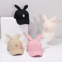 Load image into Gallery viewer, Introducing the adorable Bunny Ears Baseball Hat, available in pink, black, white, and khaki for children newborn to 3 years old! Perfect for adding a touch of cuteness to any outfit.
