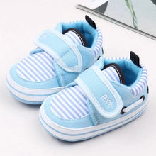 Load image into Gallery viewer, Your little one will be the most stylish walker on the block with these adorable sneakers! Built with a non-slip cotton sole, these shoes are perfect for those first steps and will keep your little rascal safe and secure. Give your child the best start with these fashionable and functional shoes.
