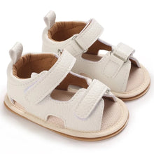 Load image into Gallery viewer, Indulge your little one in the ultimate comfort with our Valentina Baby Sandals, available in a variety of vibrant colors including green, black, white, and brown. Perfect for newborns up to 18 months, these stylish sandals are sure to make a statement and keep your baby&#39;s feet looking and feeling great..
