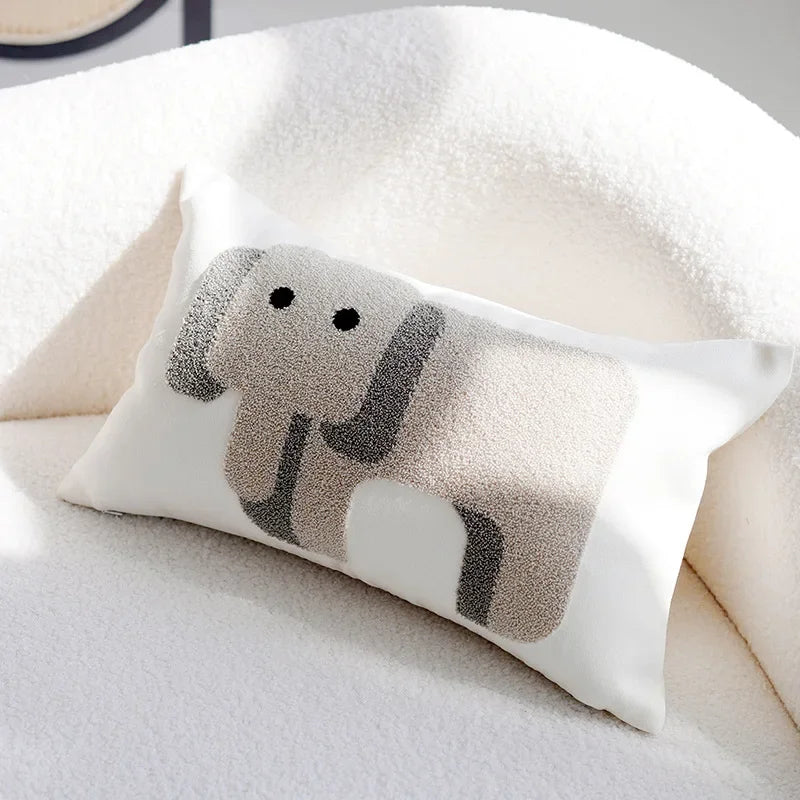 Transform your child's bedroom into a whimsical oasis with our Little Grey Elephants Pillow Case. Available in multiple sizes, this adorable pillow cover features cute white and grey elephants that will add a charming touch to any room. Livieboo kids Home decor New York