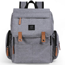 Load image into Gallery viewer, This multifunctional diaper backpack in cool grey is equipped with a thermal pocket, making it the perfect addition to any parent&#39;s arsenal. 
