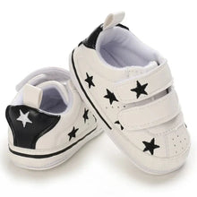 Load image into Gallery viewer, Elevate your little one&#39;s style with our Sporty Star Sneakers, designed for newborns to 18 months. These breathable, non-slip shoes feature a crisp white color and sleek black stars, perfect for budding athletes.
