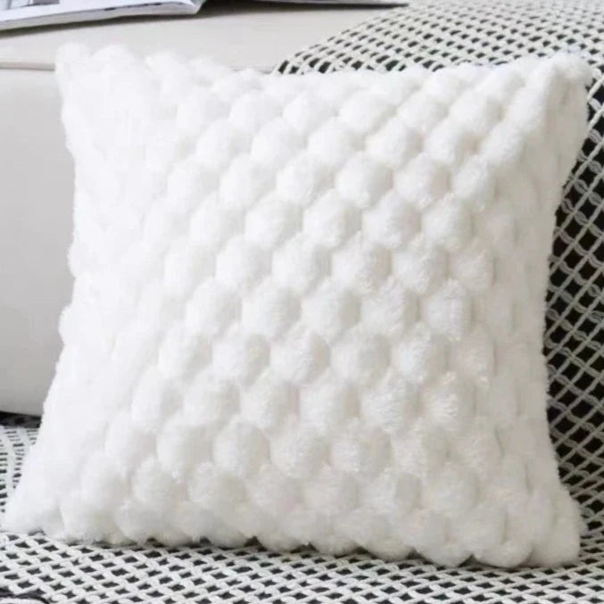 Looking for a playful touch to add to your kid's bedroom? Look no further than our White Plush Pillow Cover! Made with a blend of polyester and cotton, this handmade woven cover is the perfect addition to any room. Pillow Inserts not included.