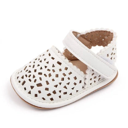 There's nothing cuter than watching your little one take their first steps in our Barcelona Baby Sandals! Available in magenta, white, brown, and black, these non-slip casual shoes feature soft soles for maximum comfort and support. Perfect for little explorers on the go, you can trust that our sandals will keep your baby's precious feet safe and comfy all day long. Give them the gift of style and functionality with our versatile Barcelona Baby Sandals!&nbsp;