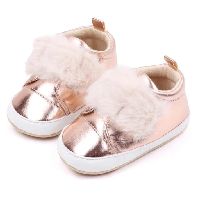 Discover the most adorable infant rose gold footwear available for newborns up to 18 months! Our selection boasts rose gold, glossy black, and shimmering silver options. These non-slip, cozy shoes feature soft soles perfect for everyday wear.