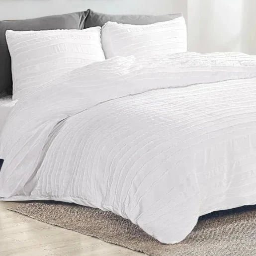 Transform your bedroom with our White Tufted Duvet Cover Set, made from the softest microfiber that replicates light fluffiness. The stunning tufted design adds a touch of beauty and elegance, perfect for layering with other cozy and tactile accessories. Available in full, queen, king, and California King sizes, this set offers amazing huggable softness for you to indulge in. Ignite your senses and elevate your sleep experience with this must-have product!