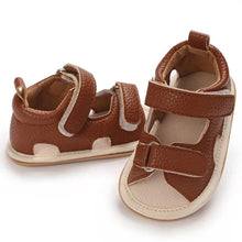 Load image into Gallery viewer, Indulge your little one in the ultimate comfort with our Valentina Baby Sandals, available in a variety of vibrant colors including green, black, white, and brown. Perfect for newborns up to 18 months, these stylish sandals are sure to make a statement and keep your baby&#39;s feet looking and feeling great..
