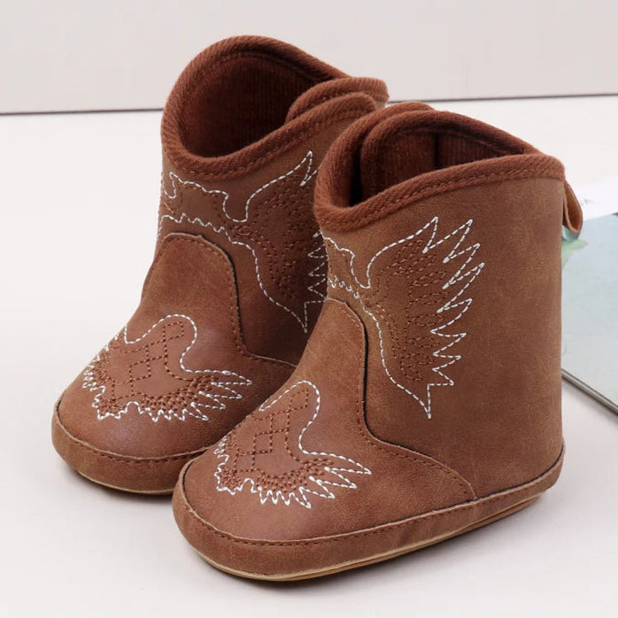 Expertly crafted with comfort and style in mind, these baby boots are the perfect addition to your little one's wardrobe. Made for newborns up to 18 months, these boots provide both support and flexibility for growing feet.