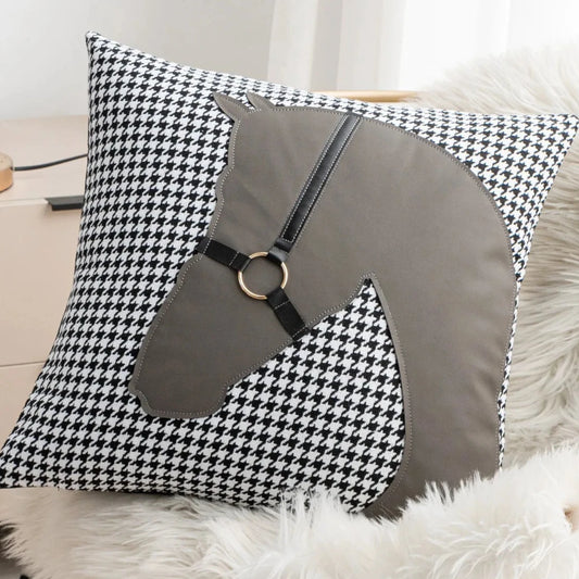 Create a cozy and stylish space for your child with our Grey Horse Houndstooth Pillowcase. Made from high-quality materials, this pillowcase is not only soft and comfortable, but it also adds a touch of sophistication to any room. Let your child's imagination run wild as they drift off to sleep on this beautiful pillowcase. It's the perfect addition to any kid's bedroom or playroom!