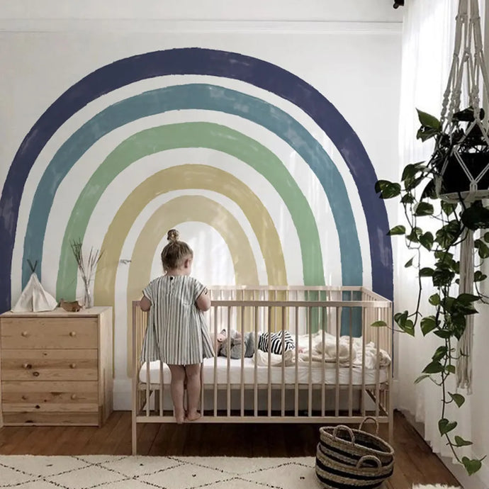 Transform your child's bedroom with the vibrant and versatile Blue green and khaki Rainbow Wall Decal. Available in multiple sizes, this peel and stick decal is made of high-quality adhesive fabric that is waterproof and easy to install. Its eco-friendly and non-toxic material ensures a safe and odorless environment for your little ones. Elevate the style and charm of your home with this must-have wall decal.