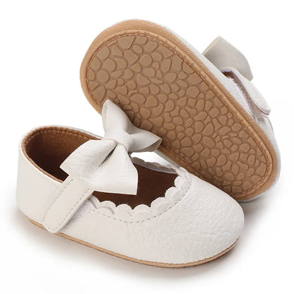 Indulge your little one's feet with our adorable Mary Jane baby shoes in a selection of sweet colors. Perfect for newborns through 18 months old, choose from white, black, apricot, and brown to match any outfit.