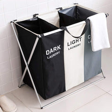 Load image into Gallery viewer, This laundry basket is the perfect choice for busy families. Its sturdy 600D Oxford fabric construction and foldable design give it durability and convenience respectively. Whether you choose the large or XL-large size, you won&#39;t have to worry about sorting laundry—the aluminum/fiberglass rod and Oxford fabric will stand up to any load. A reliable and stylish addition to any home.
