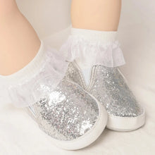 Load image into Gallery viewer, Not only will your little angel look fashionable in these stylish gold, silver and white baby loafers, but they will also stay safe and comfortable with their anti-slip, soft-sole design. Perfect for newborns up to 18 months, these shoes are easy to put on and take off, making your life as a busy parent a little easier. Provide your child with both fashion and function with our sparkling loafers in multiple colors and sizes.
