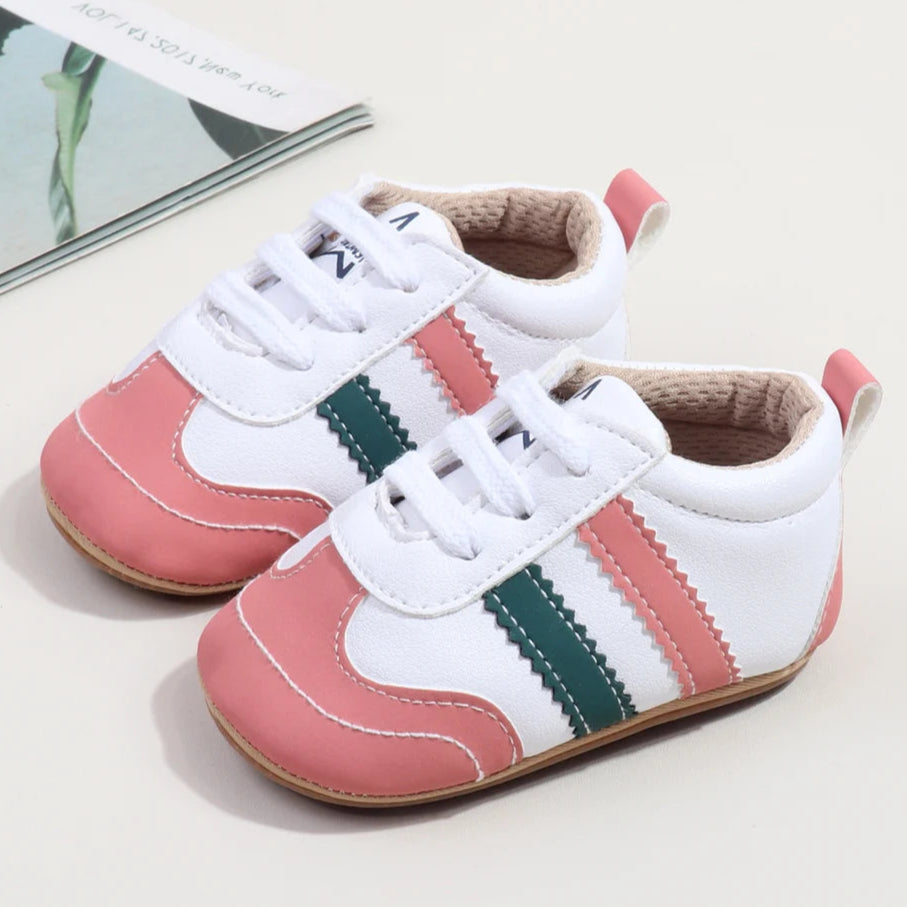 Designed with expert precision, these baby sneakers are crafted to fit children aged newborn through 18 months old with ultimate comfort and style.