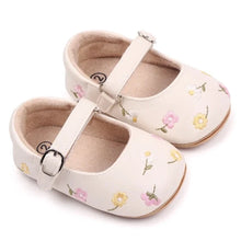 Load image into Gallery viewer, Get ready for your little one to step out in style and comfort with these charming embroidered baby shoes! The delicate butterfly-knot design adds a touch of whimsy to any outfit, making your baby the center of attention wherever you go. Perfect for newborns up to 18 months, these shoes will keep your baby&#39;s feet cozy and supported as they grow and explore the world around them. Give your baby the gift of fashion and function with these adorable baby shoes
