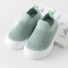 Load image into Gallery viewer, Indulge your little one in luxurious comfort with our exquisite slip-on shoes, available in six stunning colors - blue, black, green, grey, pink, and beige. Crafted from premium TPR outsole material, these shoes are perfect for newborns and toddlers up to 2 years old. Experience effortless elegance with our slip-on closure, designed for convenience and style.
