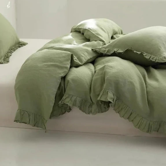 Transform your child or teenager's bedroom with the Sage Green Vintage Ruffled French Linen Duvet Cover Set, crafted from 100% washed linen. Experience the benefits of its excellent heat dissipation, breathability, and absorbency, providing ultimate comfort and durability that only gets softer with each wash.