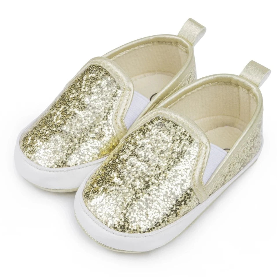 Not only will your little angel look fashionable in these stylish gold, silver and white baby loafers, but they will also stay safe and comfortable with their anti-slip, soft-sole design. Perfect for newborns up to 18 months, these shoes are easy to put on and take off, making your life as a busy parent a little easier. Provide your child with both fashion and function with our sparkling loafers in multiple colors and sizes.