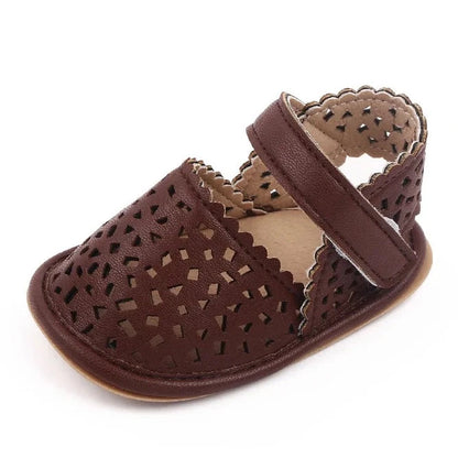 There's nothing cuter than watching your little one take their first steps in our Barcelona Baby Sandals! Available in magenta, white, brown, and black, these non-slip casual shoes feature soft soles for maximum comfort and support. Perfect for little explorers on the go, you can trust that our sandals will keep your baby's precious feet safe and comfy all day long. Give them the gift of style and functionality with our versatile Barcelona Baby Sandals!