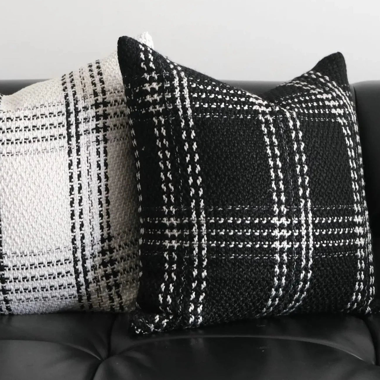 This handmade black plaid pillow cover is the perfect addition to your kids' bedroom! Made with a blend of polyester and cotton, it's both stylish and durable for your little ones. Sizes:</strong. 17.75 x 17.75 inches (45 x 45cm). 11.81 x 19.68 inches (30 x 50cm). 19.68 x 19.68 inches (50 x 50cm)