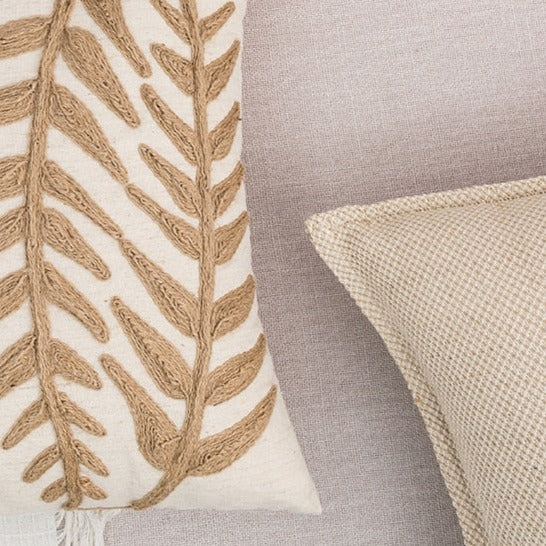 Step up your kid's room game with this fern taupe throw pillow! This soft and comfy cover features a sophisticated embroidered fern pattern, available in yellow or beige and square or rectangular shapes for tons of customization. Jazz up your nursery or little one's bedroom with a pillow that says, "I'm stylish but I don't take myself too seriously!"