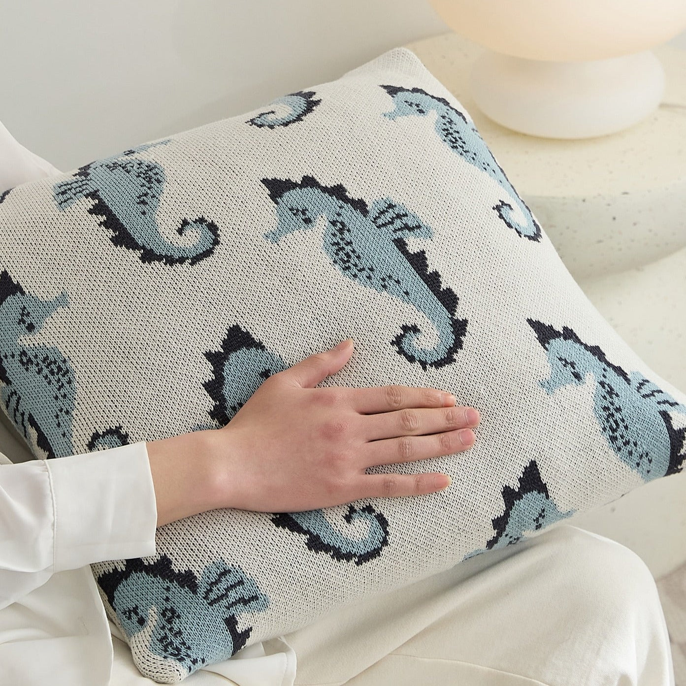 Introducing the knitted sea horse throw pillow in blue or pink! Add a cozy, soft and unique touch to your kid's bedroom or nursery with this adorable pillow cover. Its size of 17.71 x 17.71 inches (45cm x 45cm) makes it the perfect addition to any room. Made from 100% cotton, this pillow will be your kid's favorite and the perfect accent for any nursery.