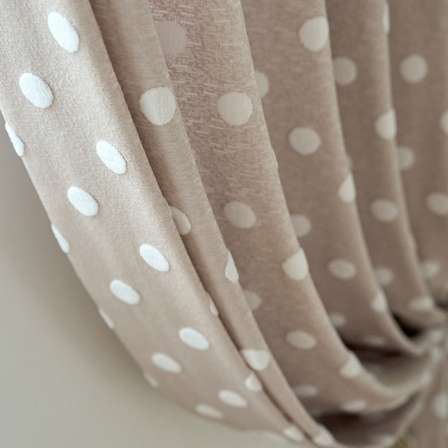 Sweet Polka dot woven curtain panel. Choose between a Grommet, Pull pleated or hook hanging application. Number of panels: 1 panel. Material: Cotton and Polyester. Pattern: Yarn Dyed. Technics: Woven.    