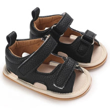 Load image into Gallery viewer, Indulge your little one in the ultimate comfort with our Valentina Baby Sandals, available in a variety of vibrant colors including green, black, white, and brown. Perfect for newborns up to 18 months, these stylish sandals are sure to make a statement and keep your baby&#39;s feet looking and feeling great..
