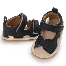 Load image into Gallery viewer, Indulge your little one in the ultimate comfort with our Valentina Baby Sandals, available in a variety of vibrant colors including green, black, white, and brown. Perfect for newborns up to 18 months, these stylish sandals are sure to make a statement and keep your baby&#39;s feet looking and feeling great..
