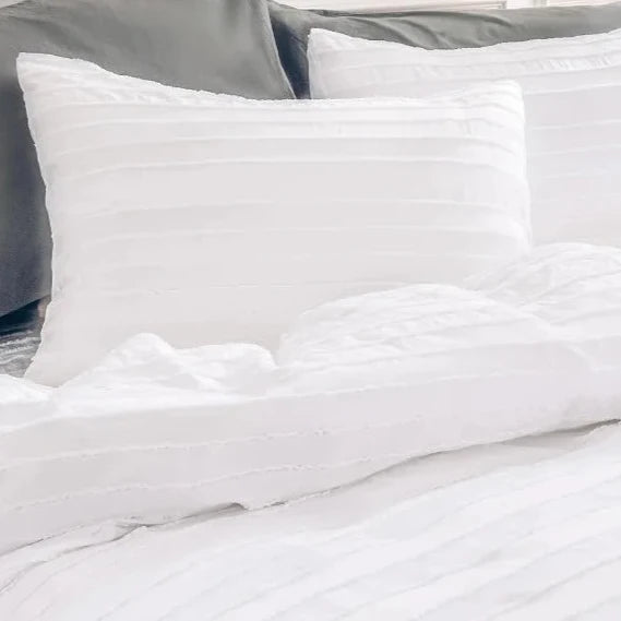 Transform your bedroom with our White Tufted Duvet Cover Set, made from the softest microfiber that replicates light fluffiness. The stunning tufted design adds a touch of beauty and elegance, perfect for layering with other cozy and tactile accessories. Available in full, queen, king, and California King sizes, this set offers amazing huggable softness for you to indulge in. Ignite your senses and elevate your sleep experience with this must-have product!