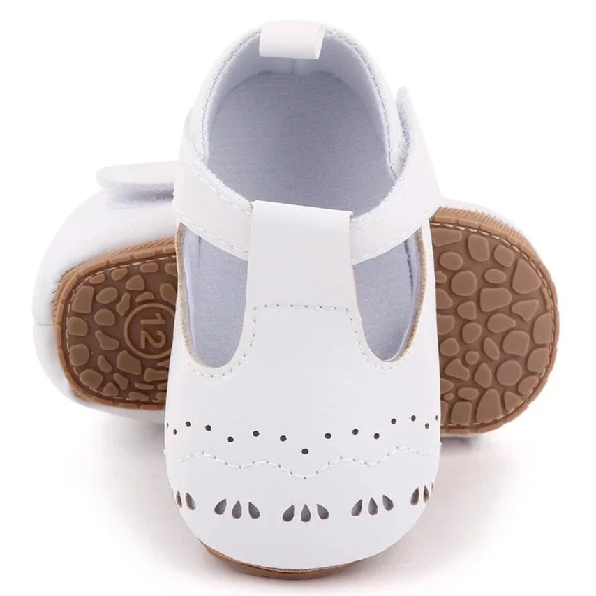 Elevate your baby's wardrobe with our stylish Palm Beach Baby Sandals, available in multiple sophisticated colors including black, white, pink, and brown. These sandals are perfect for first-time walkers, adding a touch of luxury to their every step