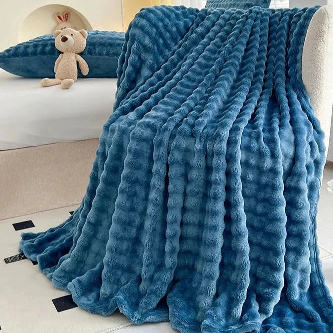 This faux fur blanket comes in 3 sizes. Wrap your child in ultimate warmth and comfort with the luxurious Blue Faux Fur Plush Blanket. Add a touch of coziness to their bedroom or playroom with this ultra soft blanket, now available in multiple sizes. It's the perfect addition to any space for a cozy and inviting atmosphere.