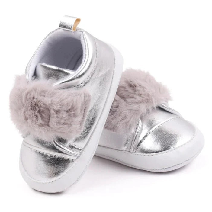 Discover the most adorable infant silver footwear available for newborns up to 18 months! Our selection boasts rose gold, glossy black, and shimmering silver options. These non-slip, cozy shoes feature soft soles perfect for everyday wear.