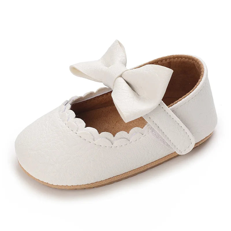 Indulge your little one's feet with our adorable Mary Jane baby shoes in a selection of sweet colors. Perfect for newborns through 18 months old, choose from white, black, apricot, and brown to match any outfit.