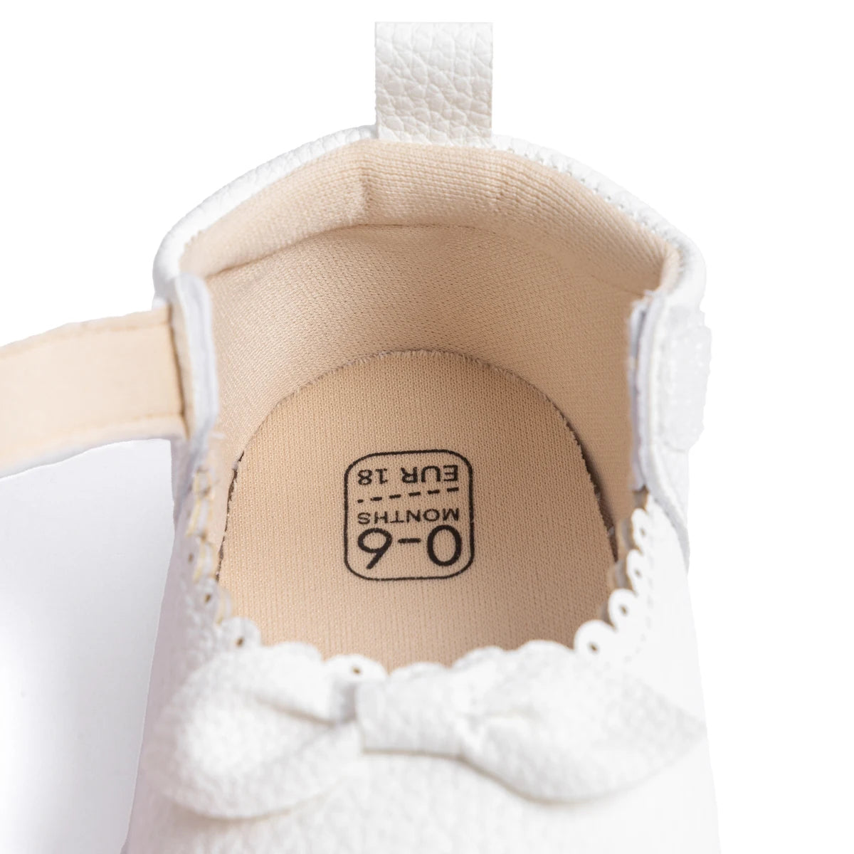 Designed with both style and comfort in mind, these Little Bow-Tie baby shoes are available in a variety of colors and sizes for newborns up to 18 months old. Each pair is meticulously crafted to provide a snug and secure fit for your little princess. Whether you're dressing them up for a special occasion or keeping them comfy for everyday wear, these shoes are the perfect choice for your little one.