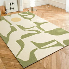 Load image into Gallery viewer, This modern minimalist green rug adds a touch of style to any room. Made of durable polyester, it’s easy to keep clean and comes in multiple sizes to fit any space. Perfect for kids&#39; bedrooms!
