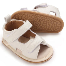 Load image into Gallery viewer, Indulge your little one in the ultimate comfort with our Valentina Baby Sandals, available in a variety of vibrant colors including green, black, white, and brown. Perfect for newborns up to 18 months, these stylish sandals are sure to make a statement and keep your baby&#39;s feet looking and feeling great..
