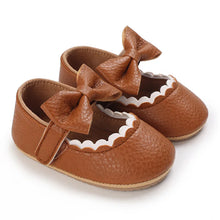 Load image into Gallery viewer, Indulge your little one&#39;s feet with our adorable Mary Jane baby shoes in a selection of sweet colors. Perfect for newborns through 18 months old, choose from white, black, apricot, and brown to match any outfit.
