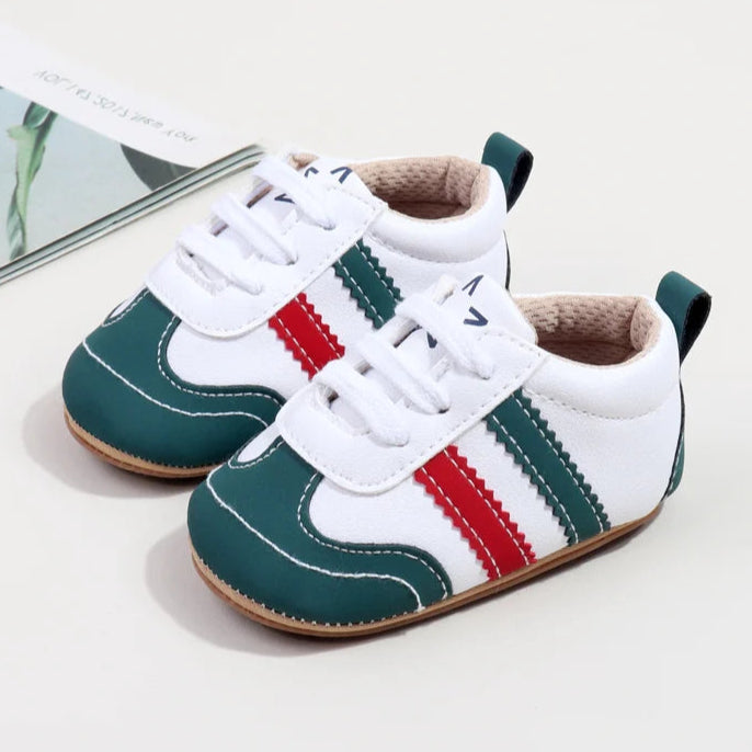 Designed with expert precision, these baby sneakers are crafted to fit children aged newborn through 18 months old with ultimate comfort and style.