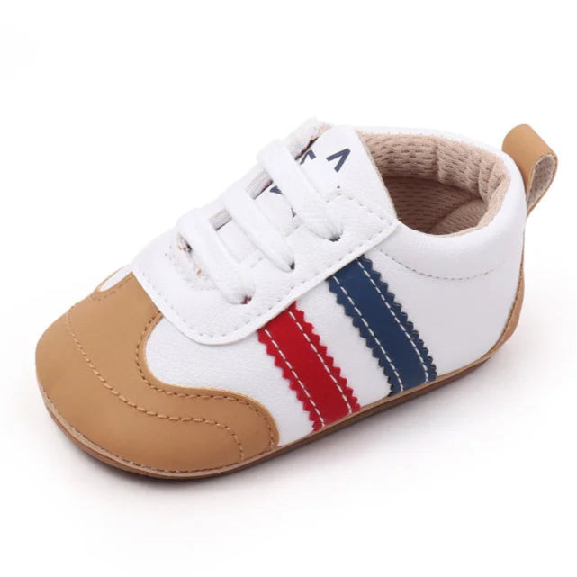 Designed with expert precision, these baby sneakers are crafted to fit children aged newborn through 18 months old with ultimate comfort and style.