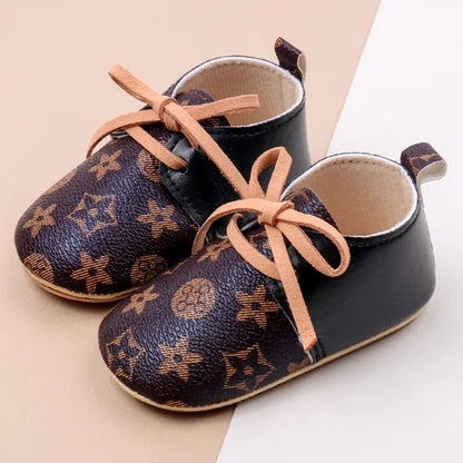 Fashionable and versatile baby shoes designed for comfort and durability. Made with high-quality materials, perfect for your little one's developing feet.