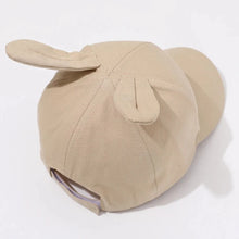 Load image into Gallery viewer, Introducing the adorable Bunny Ears Baseball Hat, available in pink, black, white, and khaki for children newborn to 3 years old! Perfect for adding a touch of cuteness to any outfit.
