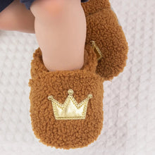 Load image into Gallery viewer, These cozy, snuggly slippers are fit for a royal baby! Made with fluffy teddy bear fabric to keep little toes warm and toasty. Available in sizes for newborns up to 18 months old. Choose from white, grey, or brown.
