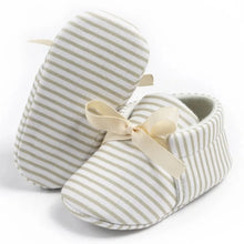 Load image into Gallery viewer, Introducing our adorable striped baby Mary Janes, available in a variety of colors and sizes, perfect for newborns up to 18 months. Experience the unmatched comfort and softness of these must-have shoes!
