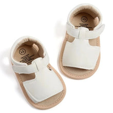 Load image into Gallery viewer, Made with soft materials and designed especially for newborns to 18 month olds, they are the perfect addition to any baby&#39;s wardrobe. Your little one will look and feel great while wearing these sandals, and you&#39;ll love the convenience of finding a quality pair of shoes that will grow with them. Don&#39;t miss out on giving your baby the best sandals for their growing feet!
